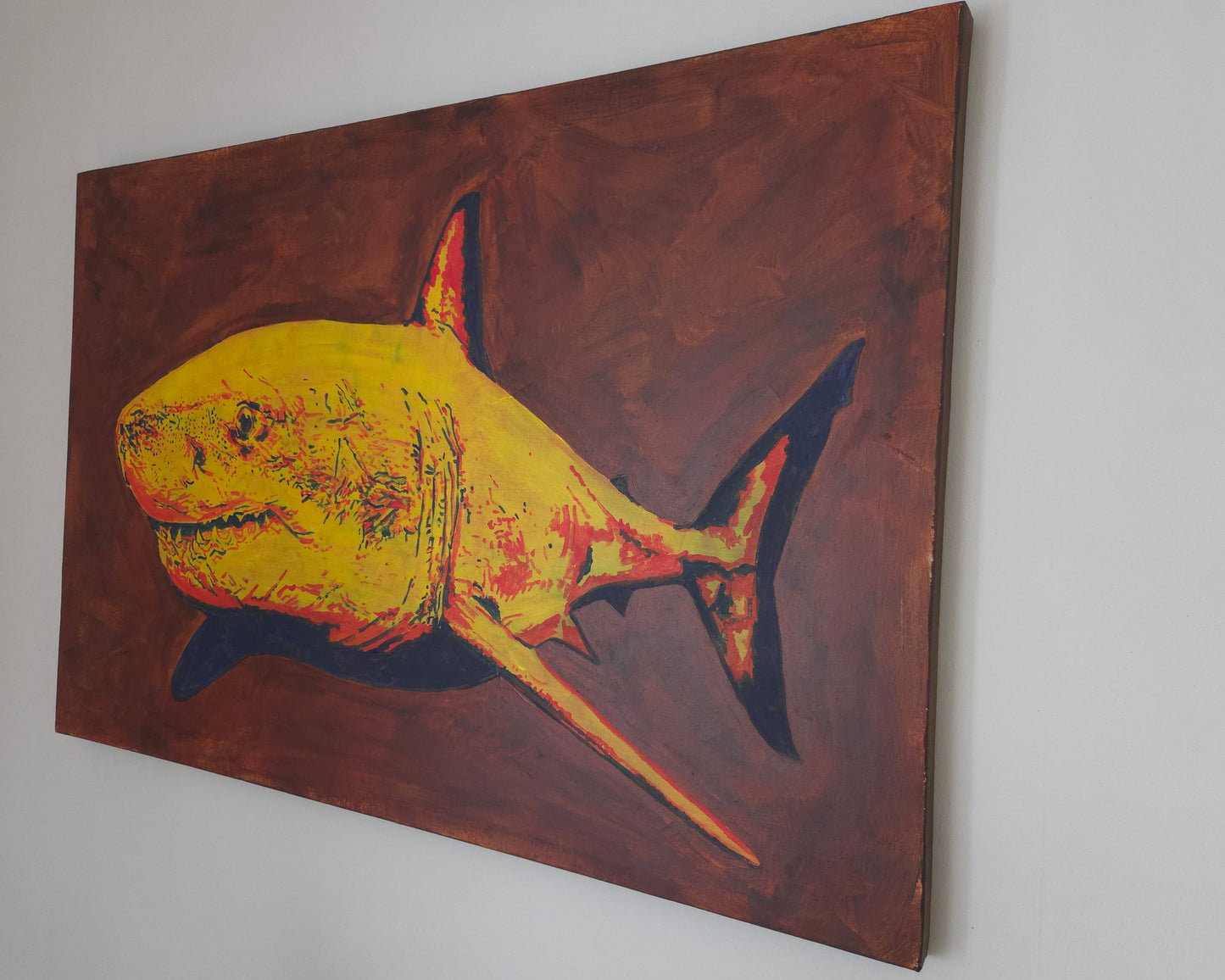 Original painting of a great white shark in red, yellow and blue by artist Joss Froggatt